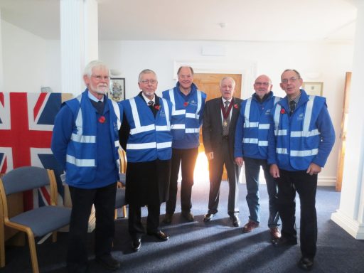 Some of our members resplendent in new hi-viz tabards for the rememberance day parade